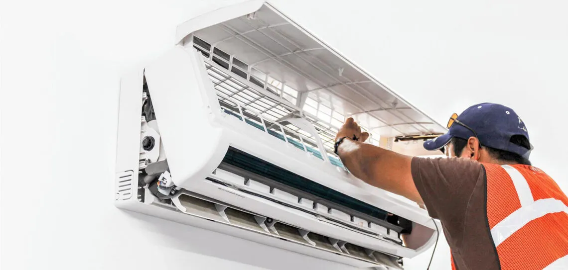 K Star technician servicing an AC unit